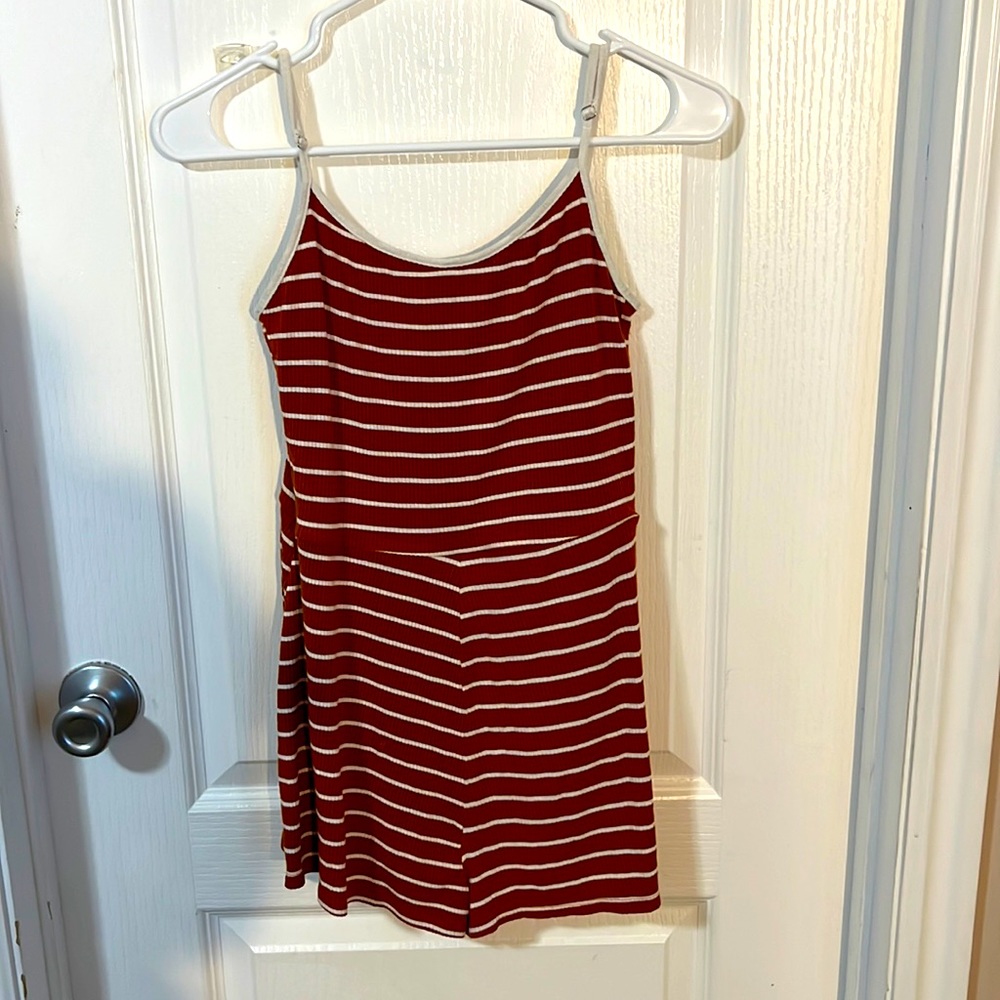 Rust orange and white romper, very stretchy